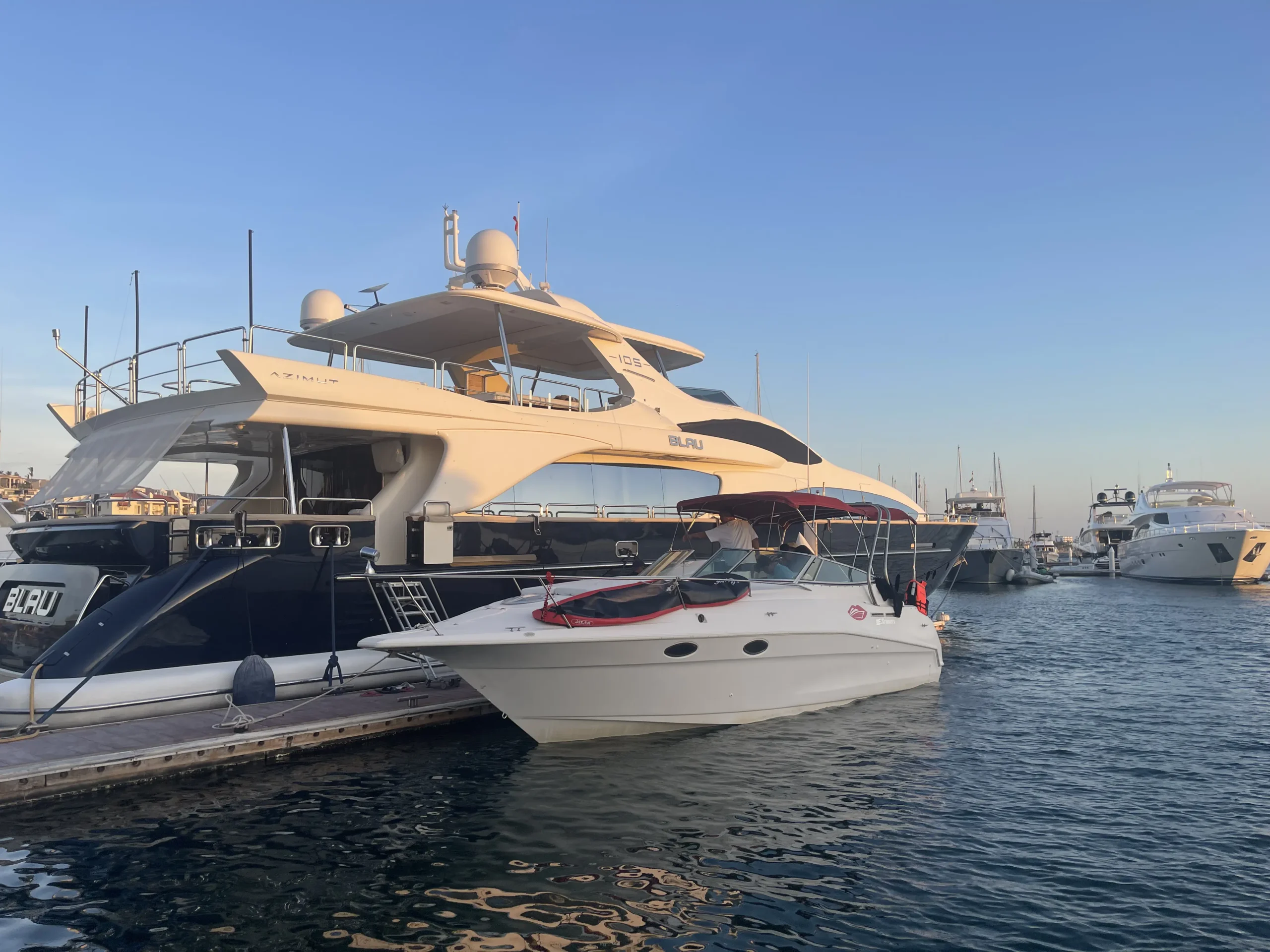 Luxury yacht charter in La Paz Marina Palmira at Sunset.