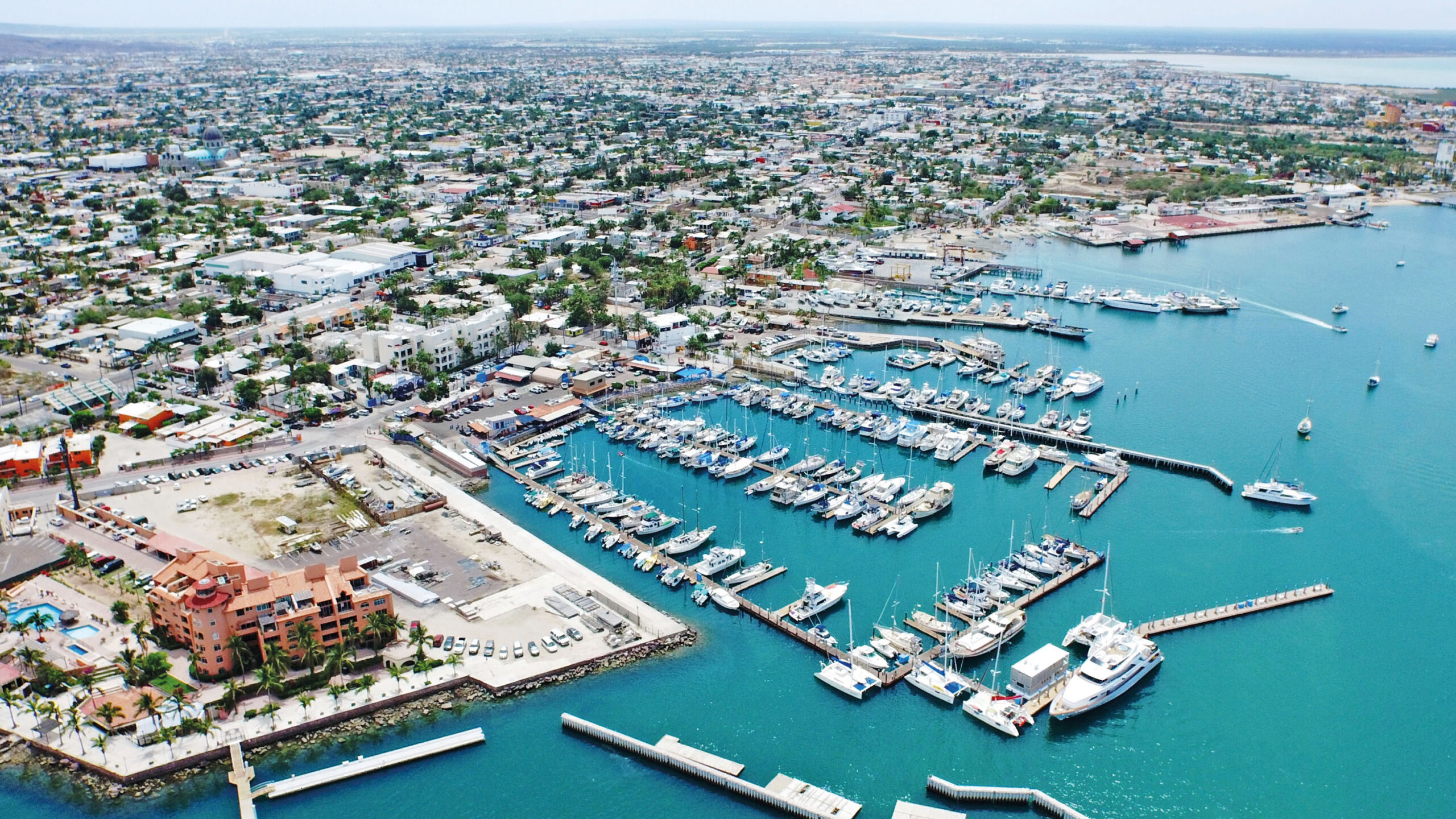 Yachts La Paz - Lover lips Drone photo of Marina de La Paz with luxury yachts and turquoise waters near Lover Lips Yachts in Baja California Sur, Mexico