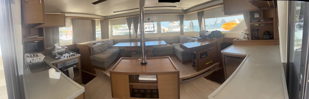 Spacious galley and kitchen interior aboard the Lover Lips Yachts catamaran villa