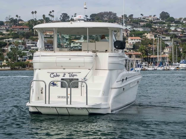 Stern of the Sea Ray 45 showing the Cabo 2 Vegas name and swim platform